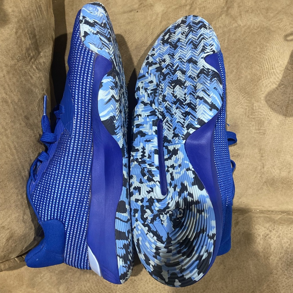 Size 14 mens blue adidas basketball shoes.  Never worn.